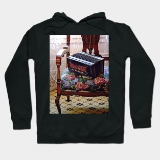 Button Accordion on Chair With Flowered Seat Hoodie